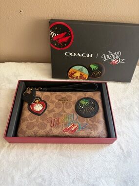 COACH The Wizard of Oz Signature Canvas Wristlet in Brown